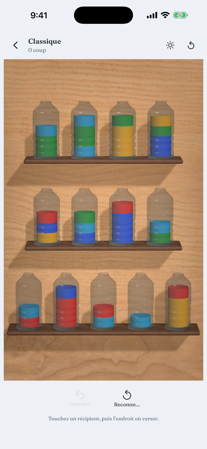 A board of glass vessels filled with layered colour