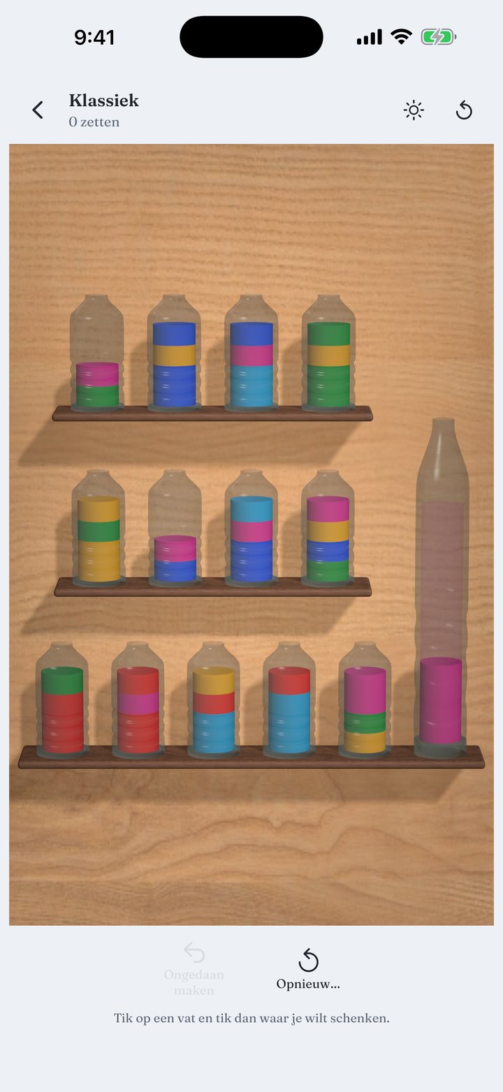 A board of glass vessels filled with layered colour
