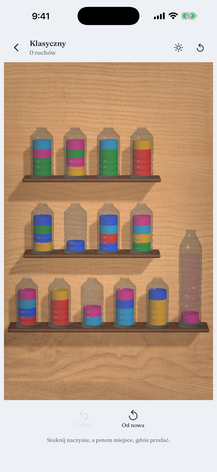 A board of glass vessels filled with layered colour