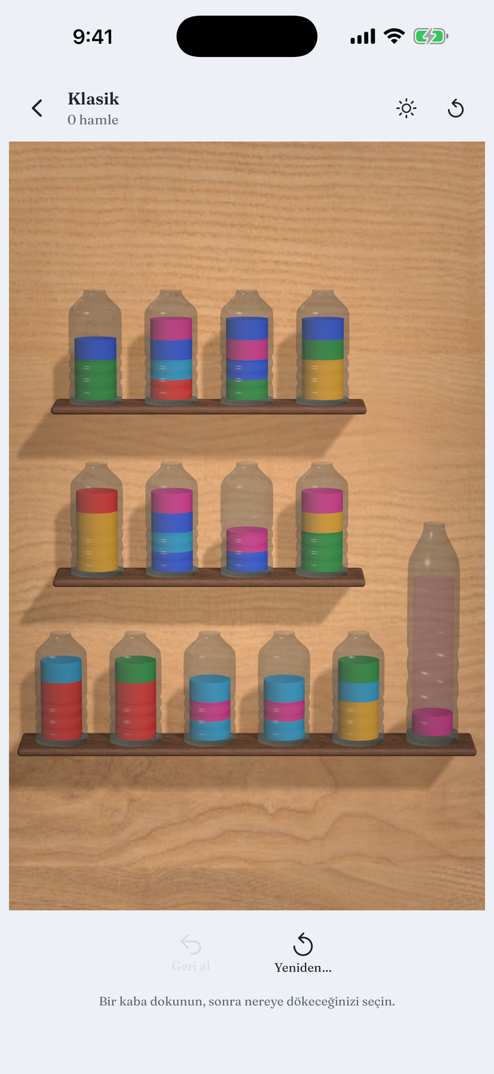 A board of glass vessels filled with layered colour